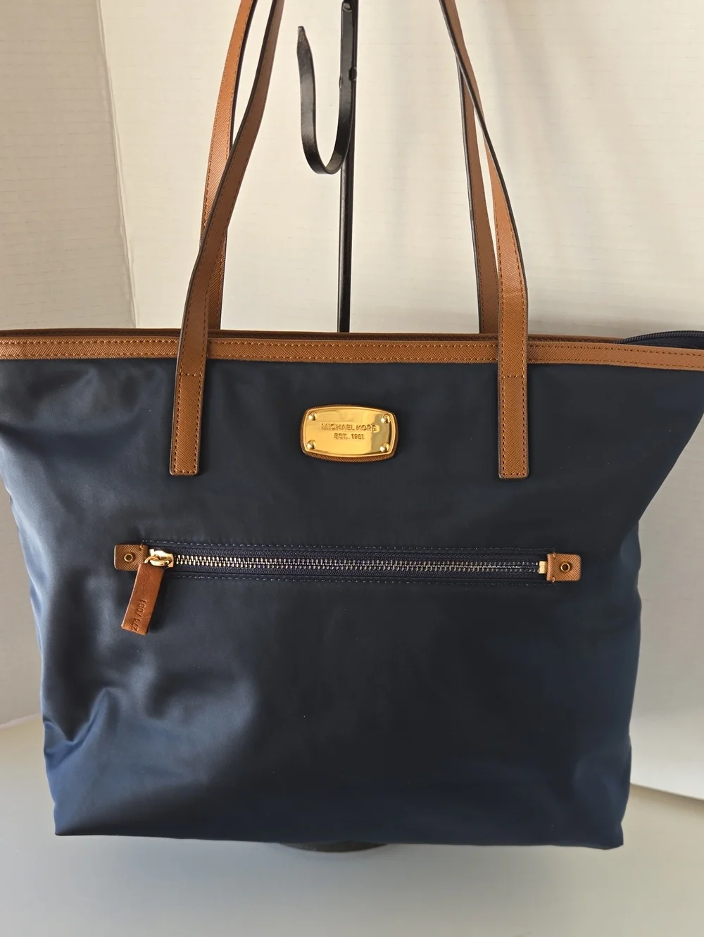 EUC Michael Kors Navy and Brown Leather-Trim Tote with Gold Plaque